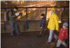 Director John Webster films his family walking, rather than driving, in the fall rain.
					Photo by Petri Kaipiainen/Kuvaryhm/SKOY